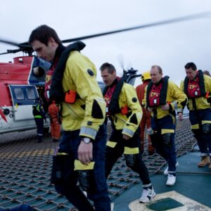 Helipad workers arriving